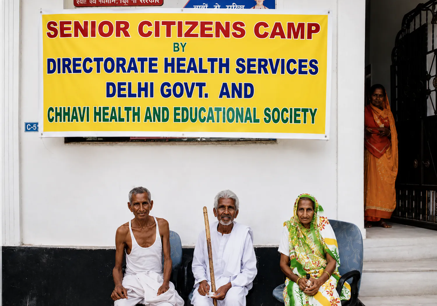 Elderly participants seated together at a CHES senior citizens camp