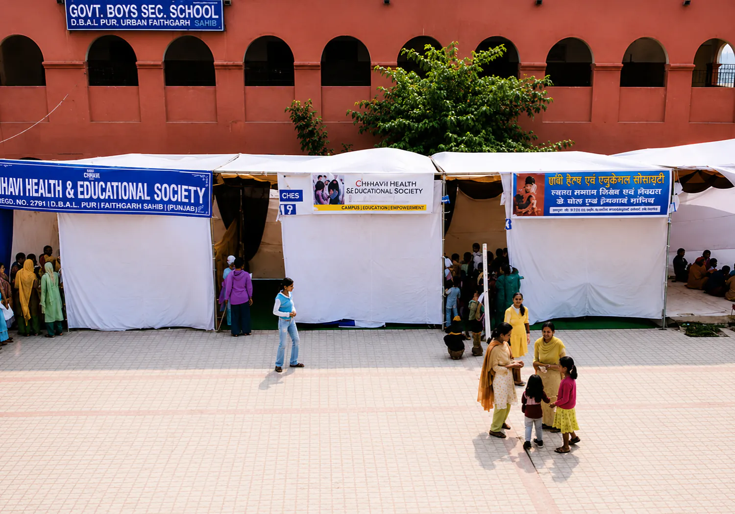 CHES camp tents set up in a government boys' secondary school courtyard